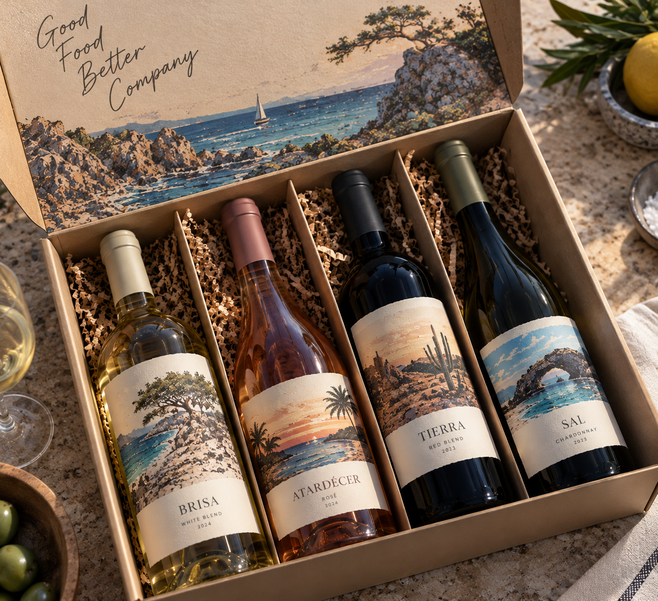 Open Good Food Better Company wine box with four bottles: Brisa white blend, Atardécer rosé, Tierra red blend and Sal chardonnay